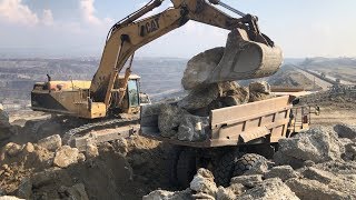 Caterpillar 375 LME Excavator Loading Rocks On Caterpillar Dumpers  Sotiriadis\Labrianidis Mining [upl. by Lohrman311]