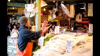 Flying Fish throwing attraction at Pike Place Market in Seattle WA [upl. by Lipps]